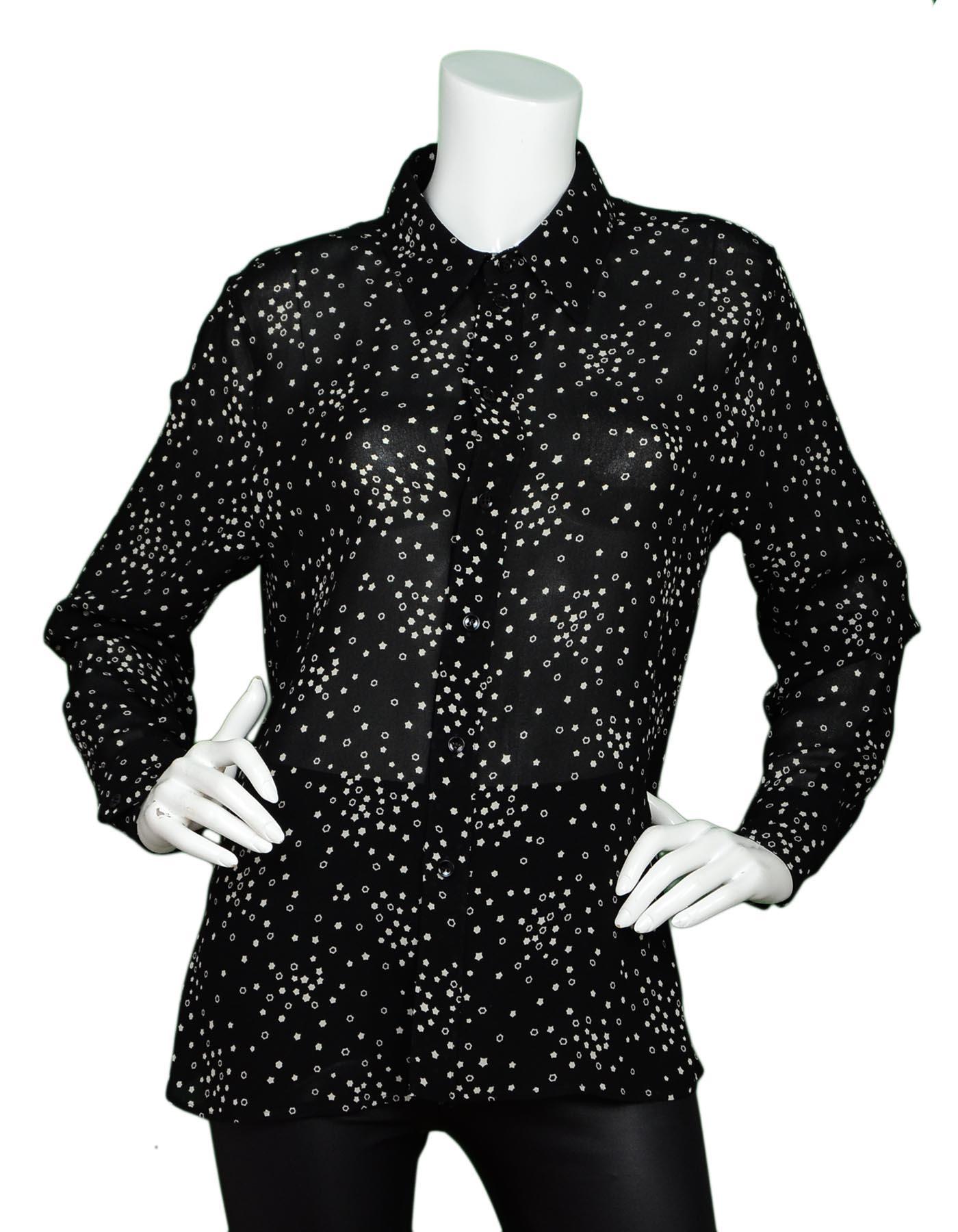 Saint Laurent Black/White Star Print Blouse Sz F 46

Made In:  Italy
Color: Black, white
Materials: 100% viscose 
Opening/Closure: Button down front
Overall Condition: Excellent pre-owned condition 

Measurements: 
Shoulder To Shoulder: 16.25