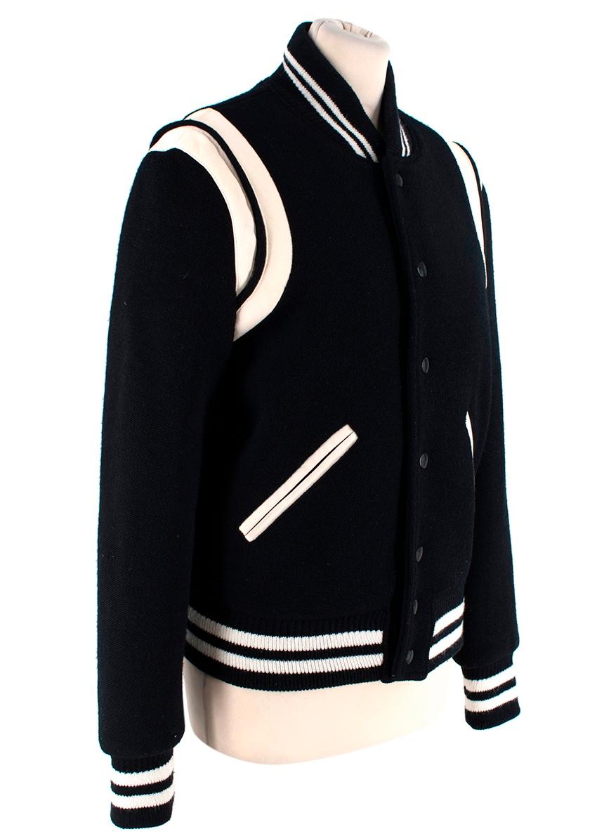 Saint Laurent Black & White Teddy Bomber Jacket
 

 - Classic varsity-style jacket from Saint Laurent featuring ribbed collar, cuffs and hemline, leathr panelling to the shoulder and press-stud fastening
 - Fully lined
 

 Materials 
 93% Virgin