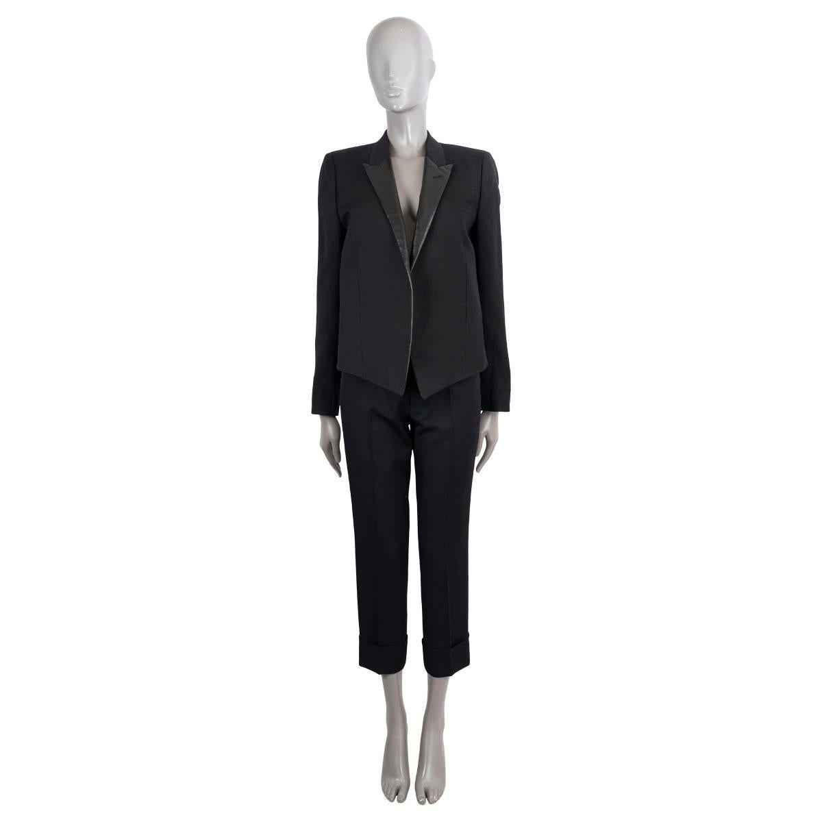 100% authentic Saint Laurent iconic open blazer in black wool (100%) with peak lapels in leather. Lined in silk (100%). Has been worn and is in excellent condition. 

2014 Spring/Summer

Measurements
Model	340074
Tag Size	42
Size	L
Shoulder