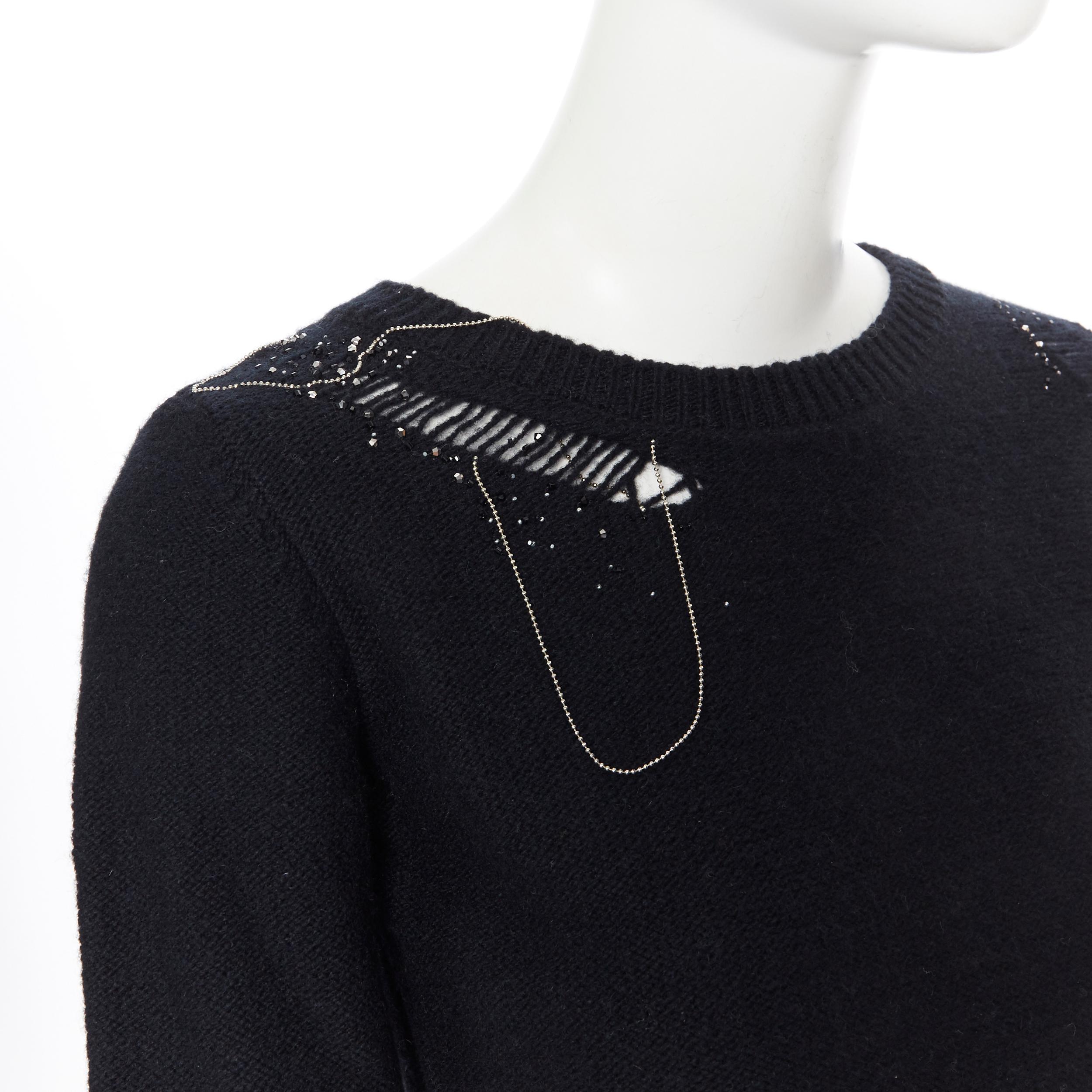 SAINT LAURENT black wool cashmere blend bead chain distressed cropped sweater XS
Brand: Saint Laurent
Designer: Hedi Slimane
Model Name / Style: Cropped sweater
Material: Wool cashmere blend
Color: Black
Pattern: Solid
Extra Detail: Jewel stone and