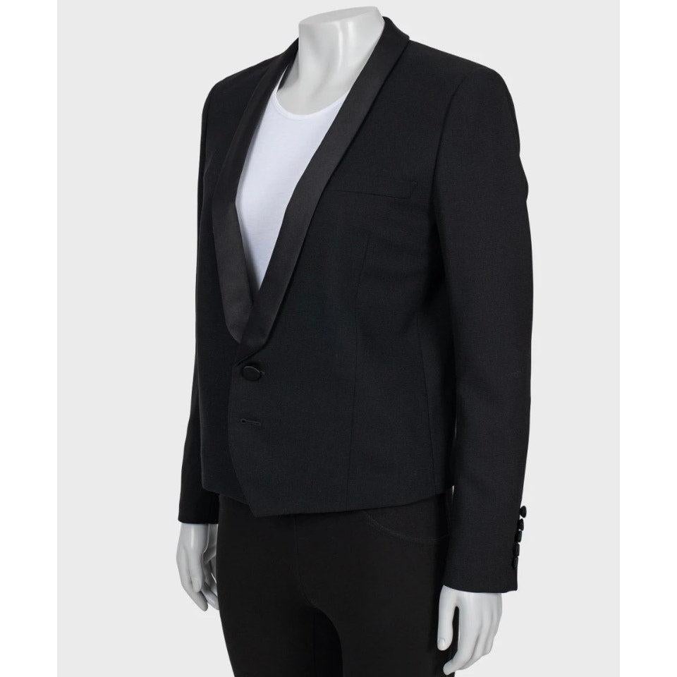 Elevate your wardrobe with this stunning Saint Laurent wool jacket! This stylish black jacket features elegant satin lapels, adding a touch of luxury to any outfit. In very good condition, with only minor signs of wear in the underarm area, this