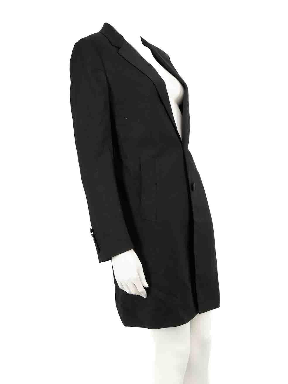 CONDITION is Very good. Minimal wear to coat is evident. Minimal wear to the left lapel with a pluck to the weave on this used Saint Laurent designer resale item.
 
 
 
 Details
 
 
 Black
 
 Wool
 
 Blazer coat
 
 Button up fastening
 
 Shoulder