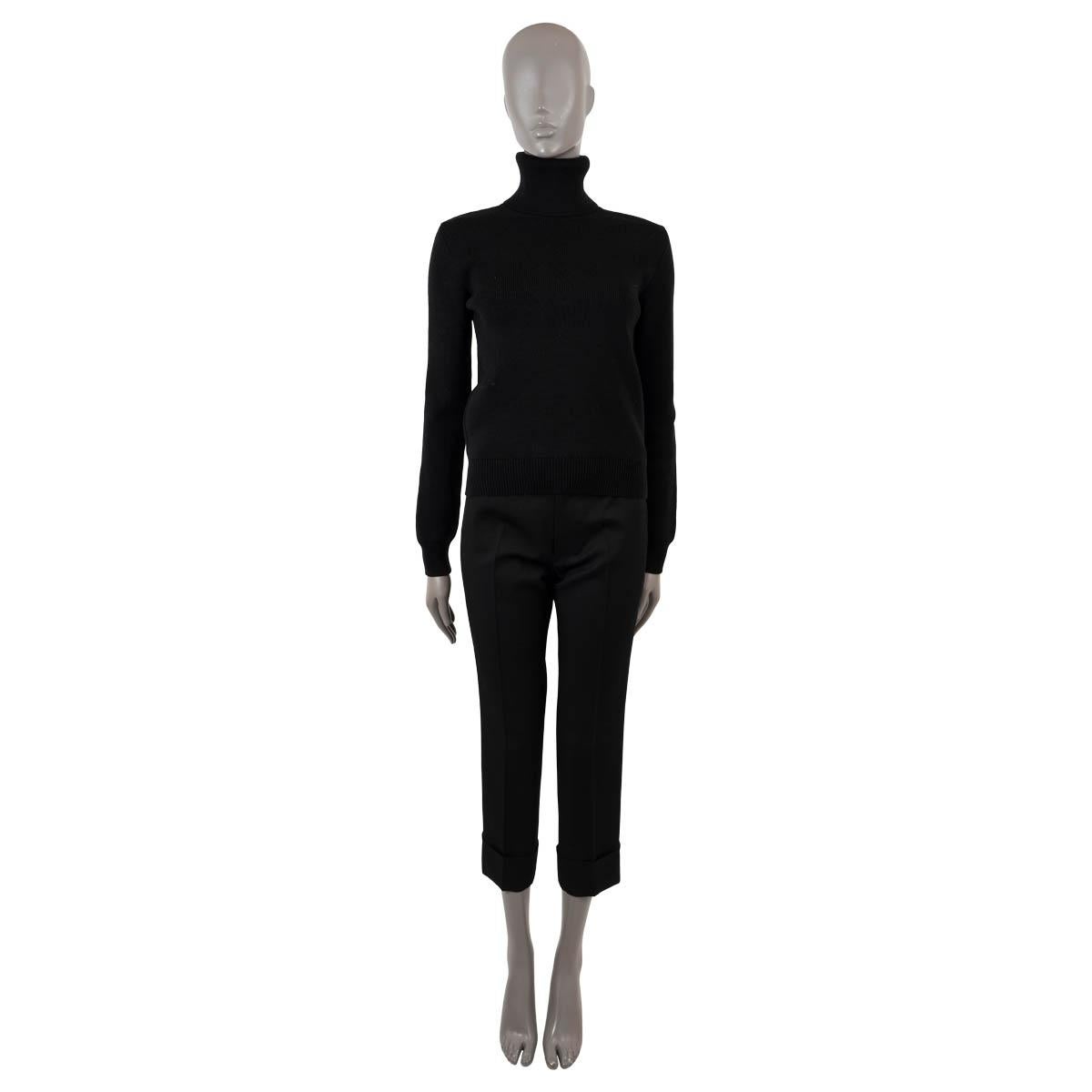 100% authentic Saint Laurent turtleneck sweater in black rib-knit wool (100%). Features rib knit cuffs and hem. Unlined. Has been worn and is in excellent condition.

Measurements
Model	537409
Tag Size	M
Size	M
Shoulder Width	39cm (15.2in)
Bust