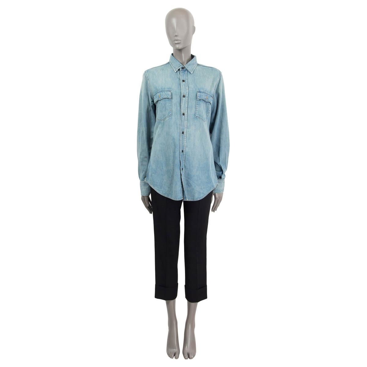 100% authentic Saint Laurent Button button-up shirt in blue cotton (100%) with a flat collar. Features two patch pockets on the front. Has buttoned cuffs. Closes with black buttons. Unlined. Has been worn and is in excellent