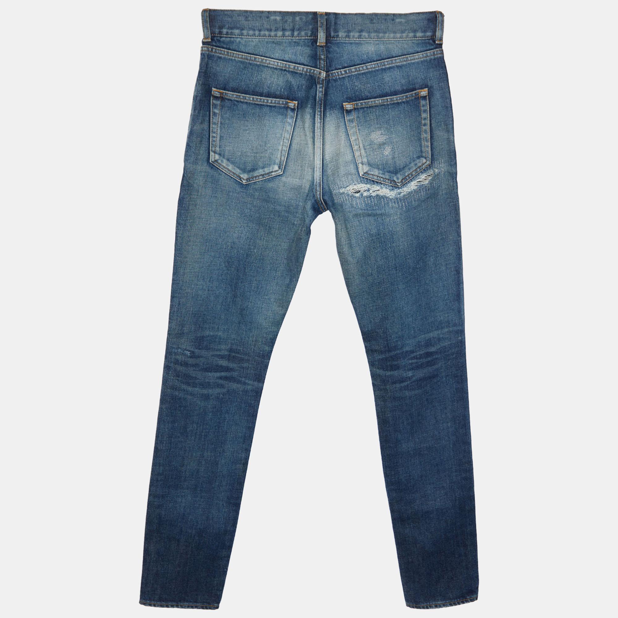 Your wardrobe can never be complete with a great pair of Saint Laurent jeans like this. Tailored from best materials, this pair showcases classic detailing, an easy closure style, and pockets. Pair it with your casual t-shirts.

