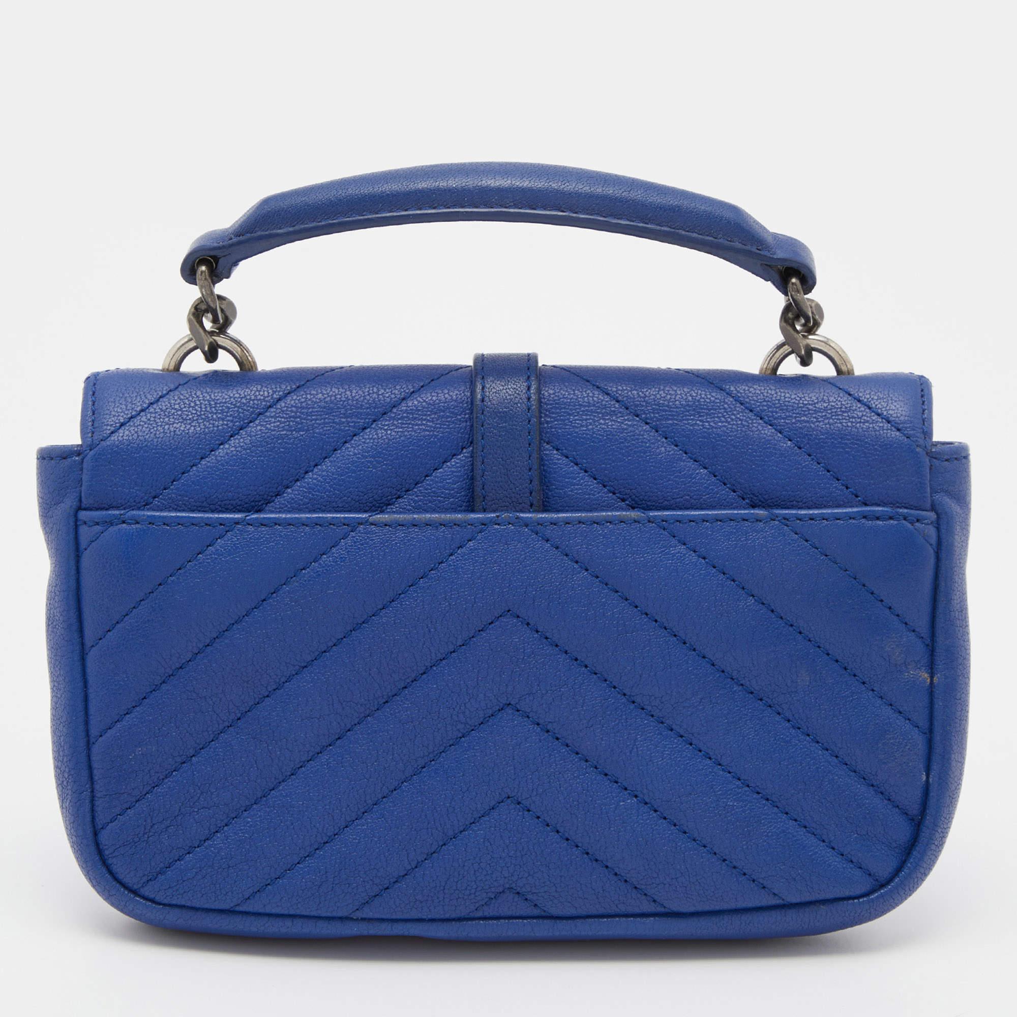 This bag from the house of Saint Laurent is an accessory you would go to season after season. It has been crafted from blue leather into a flap style. It comes with a top handle, a front logo detail, and a well-lined interior.

Includes: Detachable
