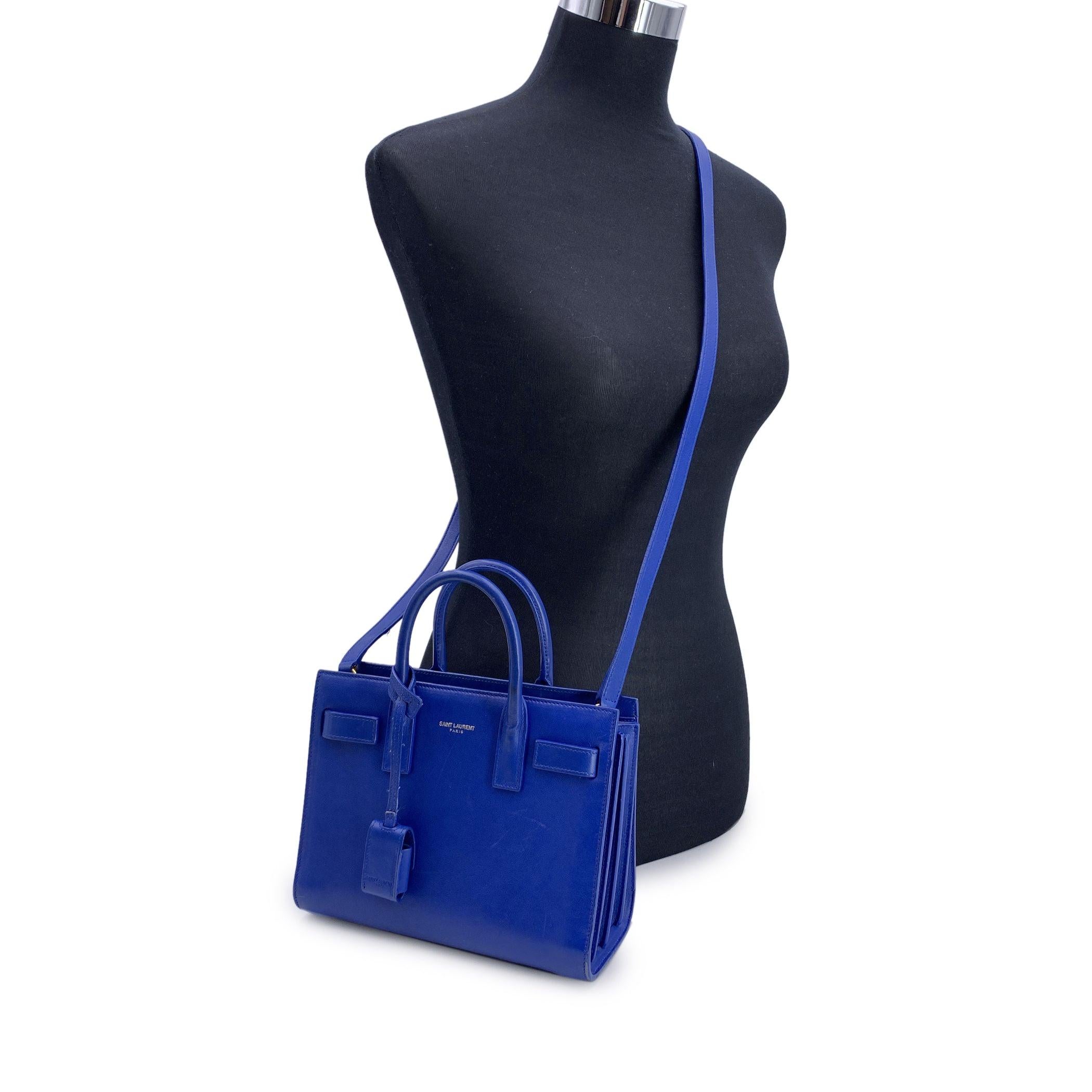 This beautiful Bag will come with a Certificate of Authenticity provided by Entrupy. The certificate will be provided at no further cost This stunning Saint Laurent 'Sac de Jour' tote bag in a rich blue leather hue is the epitome of luxury and