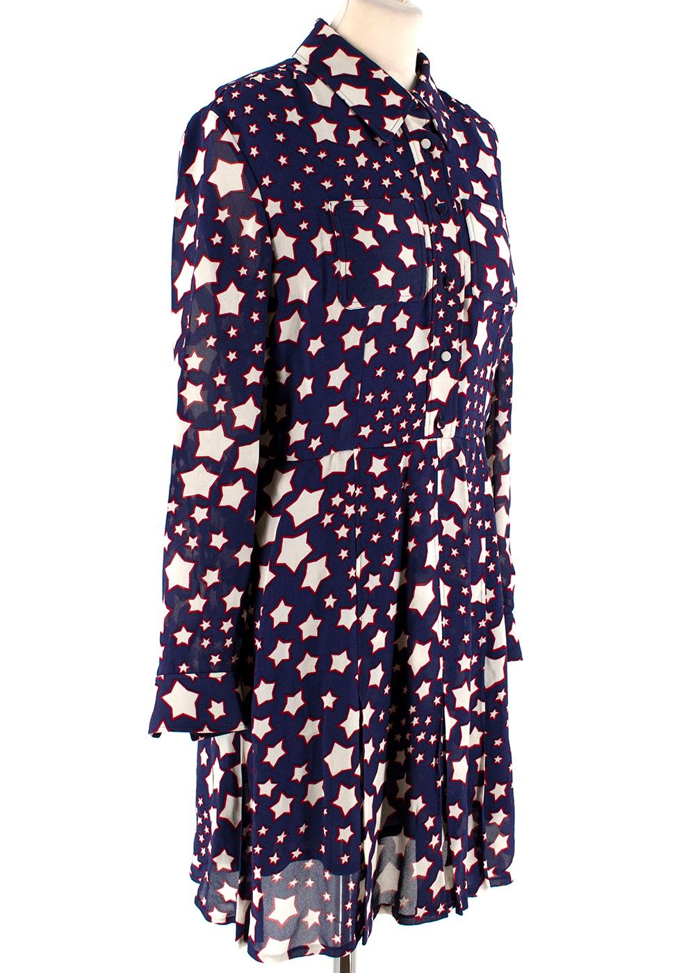 Saint Laurent Blue Midi-Length Star Print Shirt Dress

- Electric blue shirt dress 
- White and red bold star print 
- Front button-up fastening
- Double front patch pockets
- Concealed side zip 
- Pointed collar
- Buttoned cuffs
- Midi