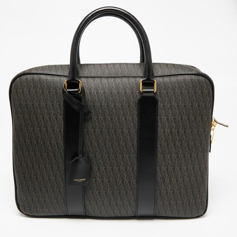 This Saint Laurent briefcase has such a fine shape that you're sure to look fashionable whenever you carry it. The women's briefcase has been crafted from coated canvas and leather and is designed with dual top handles, a detachable shoulder strap,