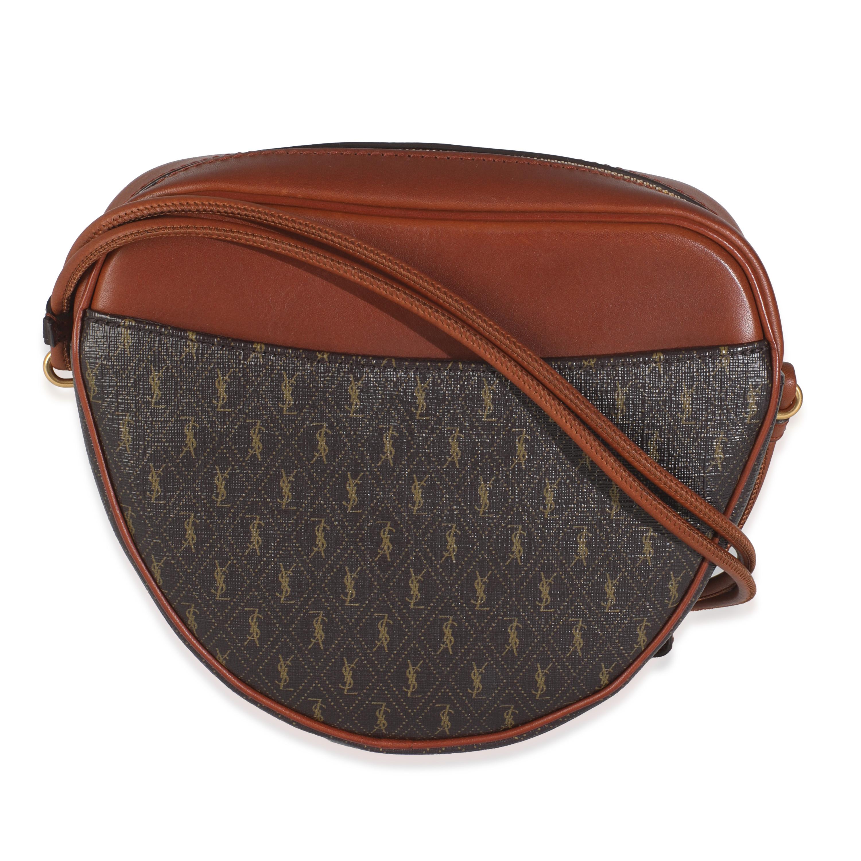 Listing Title: Saint Laurent Brown Canvas Le Monogramme Cœur Heart Bag
SKU: Z145501
Condition: Pre-owned 
Handbag Condition: Excellent
Condition Comments: Item is in excellent condition and displays light signs of wear.  Light scratching along