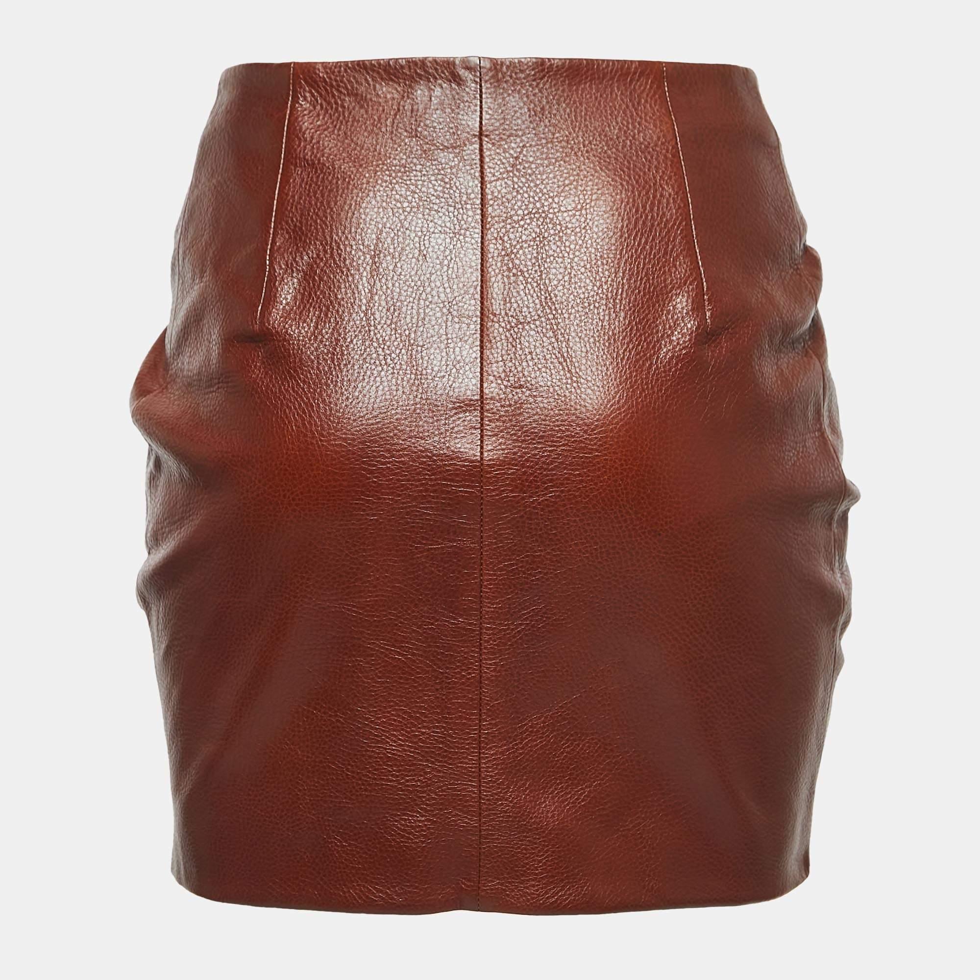 This lovely skirt is beautifully stitched from fine fabric. The comfy designer skirt has a flattering silhouette. Pair it with a simple top and strappy heels for a chic look.

