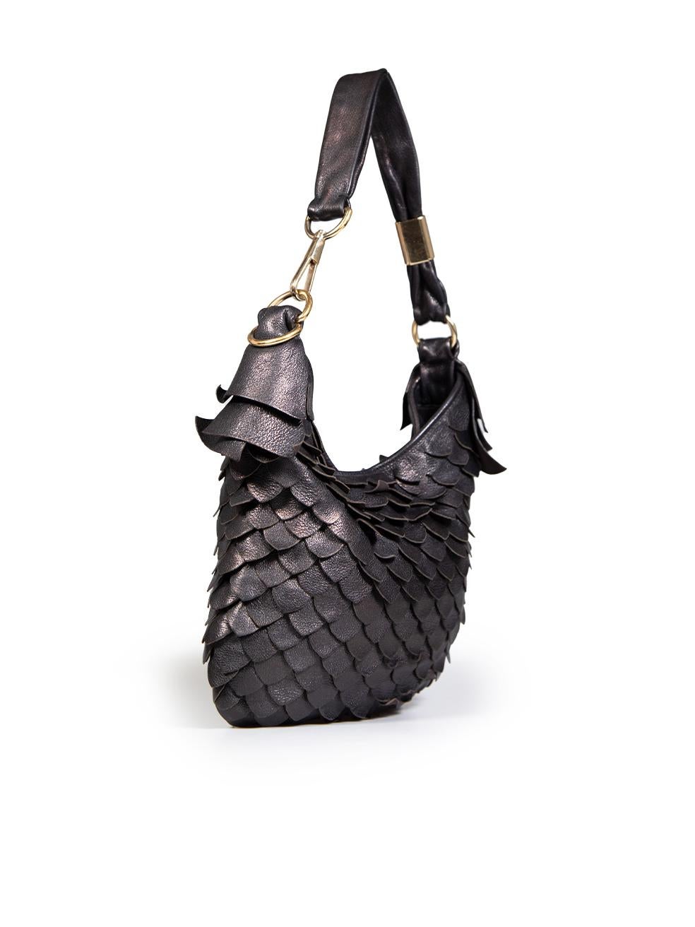 CONDITION is Good. Minor wear to bag is evident. Light signs of wear to the leather scales that have curled. There is slight tarnishing on the magnetic button this used Saint Laurent designer resale item.
 
 
 
 Details
 
 
 Model: St. Tropez
 
