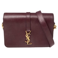 Saint Laurent Burgunderfarbene Universite Umhängetasche aus Leder mit Monogramm