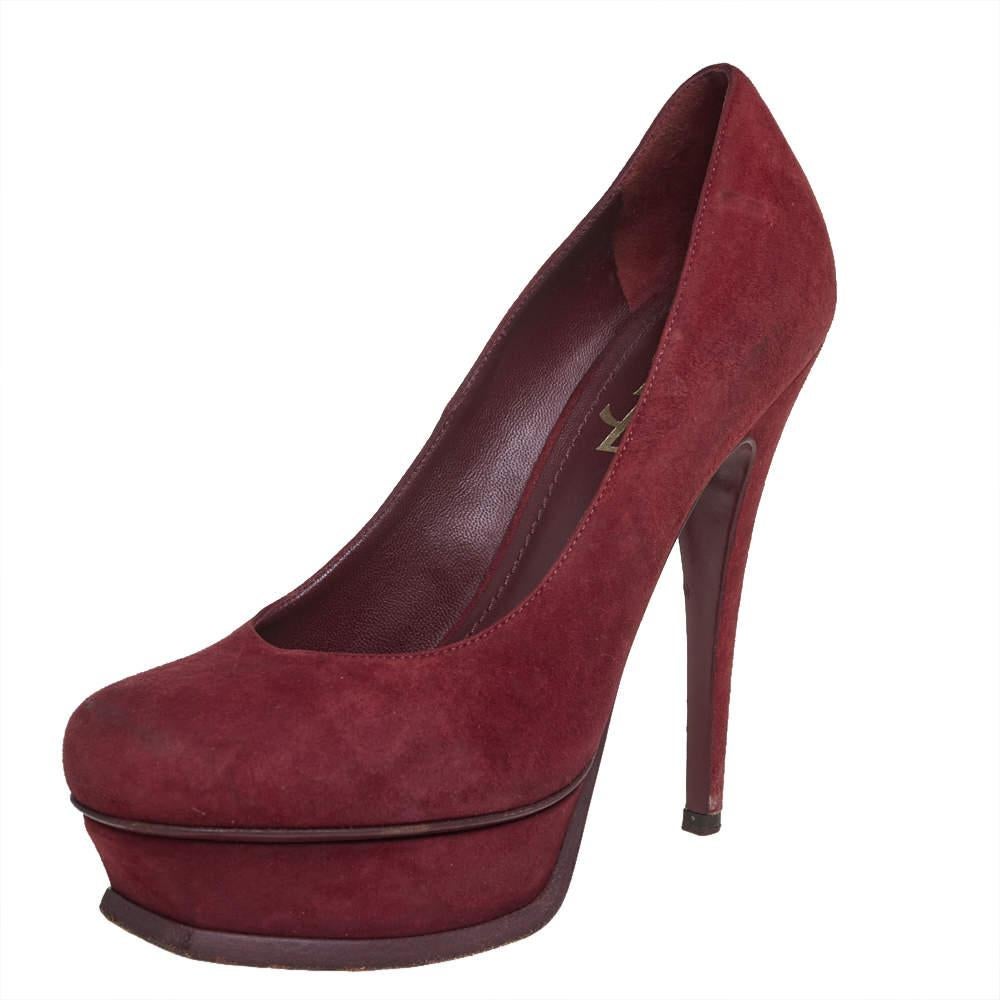 Be at the top of your fashion game by donning these Saint Laurent pumps. Fashionable and chic, these Tribtoo pumps flaunt an alluring silhouette with a timeless appeal and are crafted from burgundy suede. They are finished with chunky platforms and