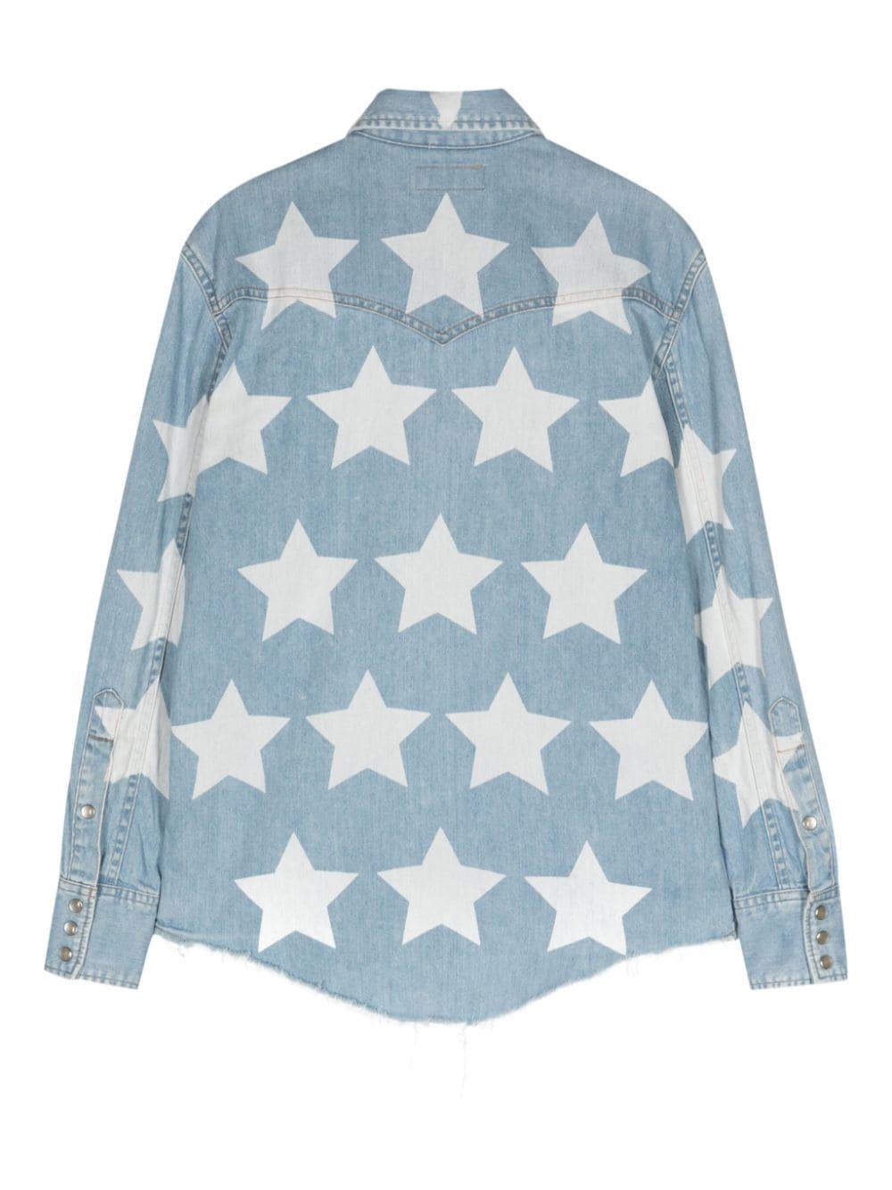 YSL Saint Laurent by Hedi Slimane blue denim shirt featuring a star-print print, a classic collar, long sleeves with press-stud fastening cuffs, two chest flap pockets, Western-style stitched yoke, raw-cut edge, curved hem, front press-stud
