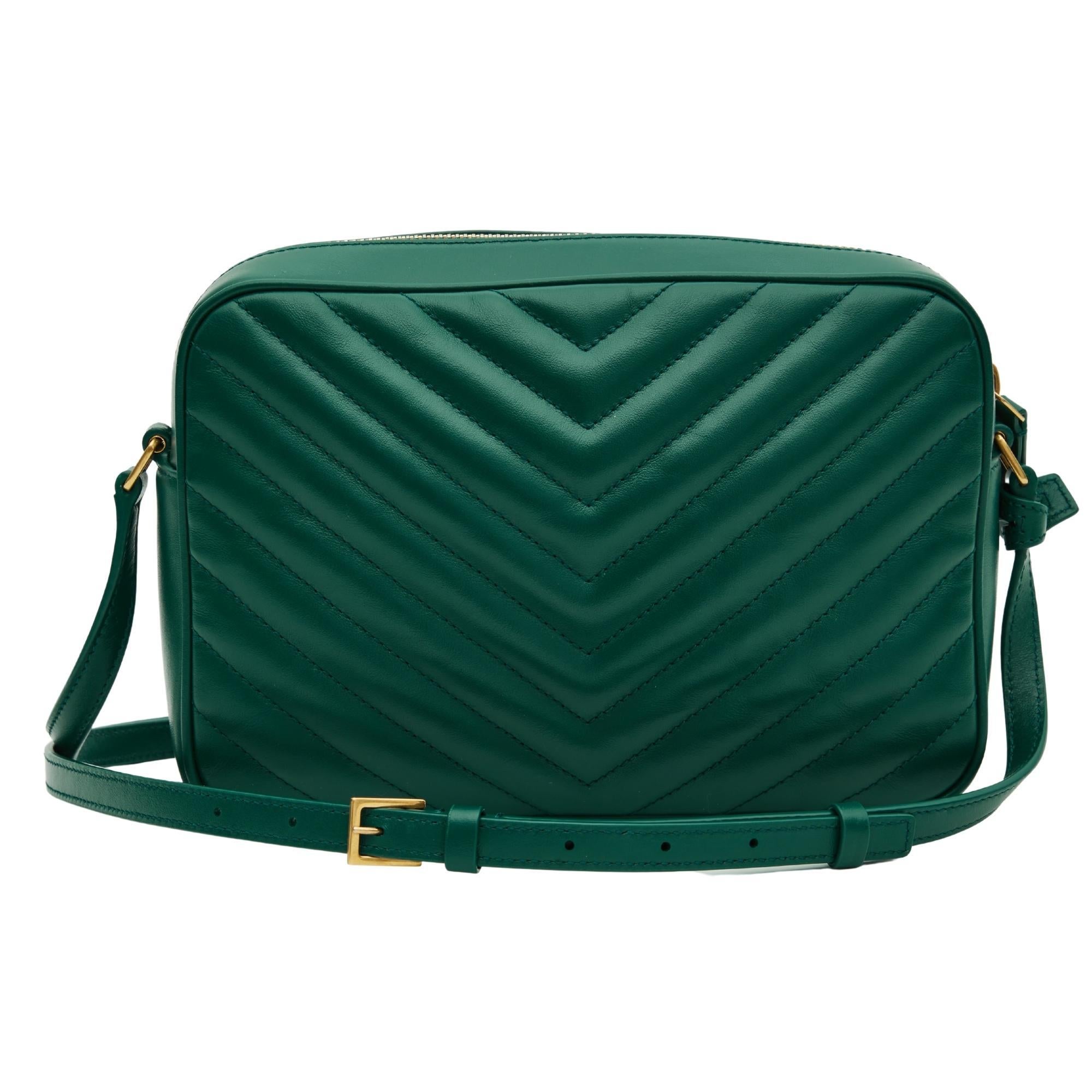 *Authenticated by entrupy*

This bag is made with calfskin leather in green and features a chevron matelasse stitch, a YSL monogram metallic logo, gold tone hardware, a decorative attachable tassel, a long adjustable shoulder strap, top zipper