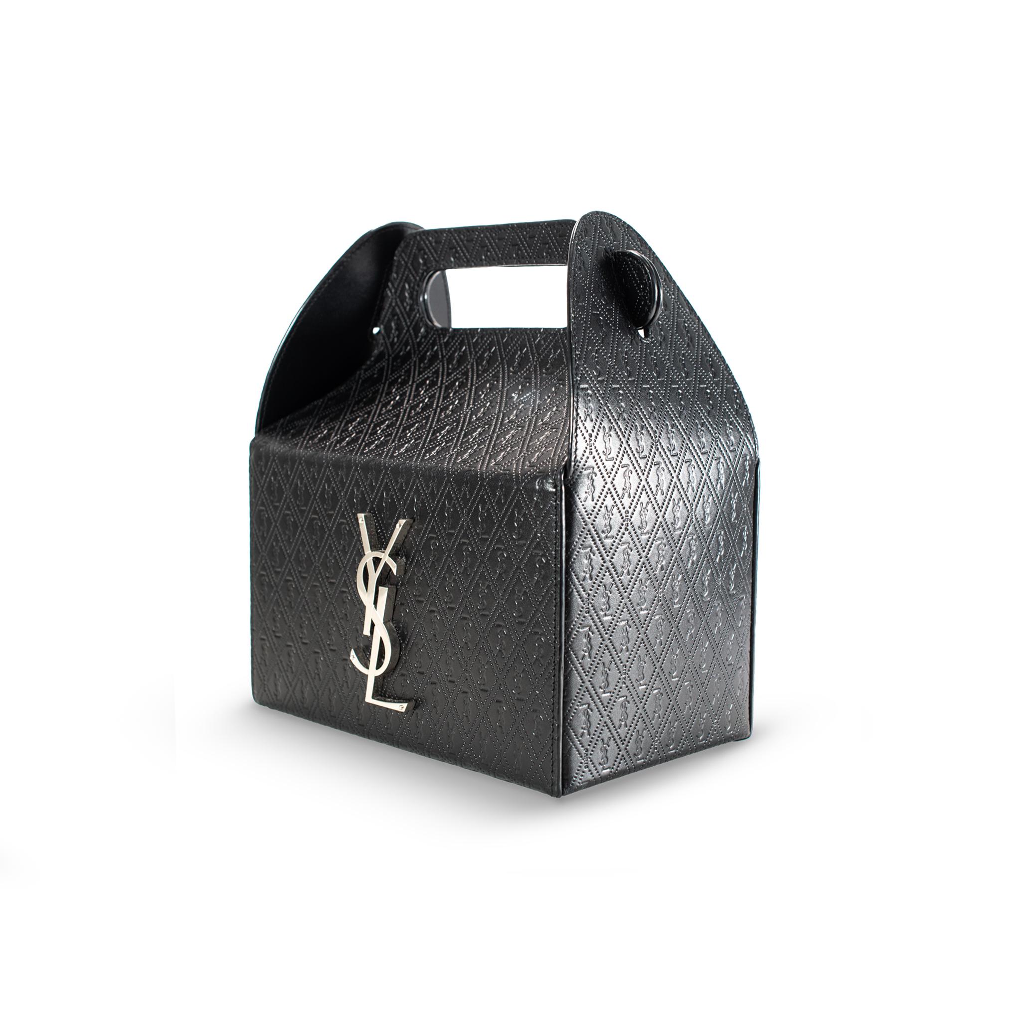 Brand: Saint Laurent

Gender: Ladies

Height: 8.20 inches

Width: 7.40 inches

Depth: 4.00 inches

Weight: 386.00 grams

Saint Laurent Calfskin Monogram Take Away Black Box Top Handle Bag. Engraved with 