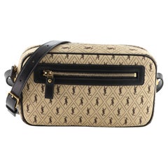 Le Monogramme small camera bag in canvas and smooth leather