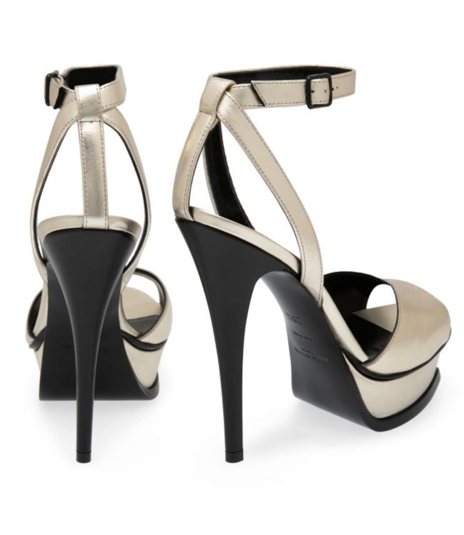 Saint Laurent Champagne Gold Leather Tribute 105 Stiletto Heel Sandal

Instantly recognisable as the works of Saint Laurent, these Tribute sandals are a signature style. Made from premium metallic leather, they come with all the key features