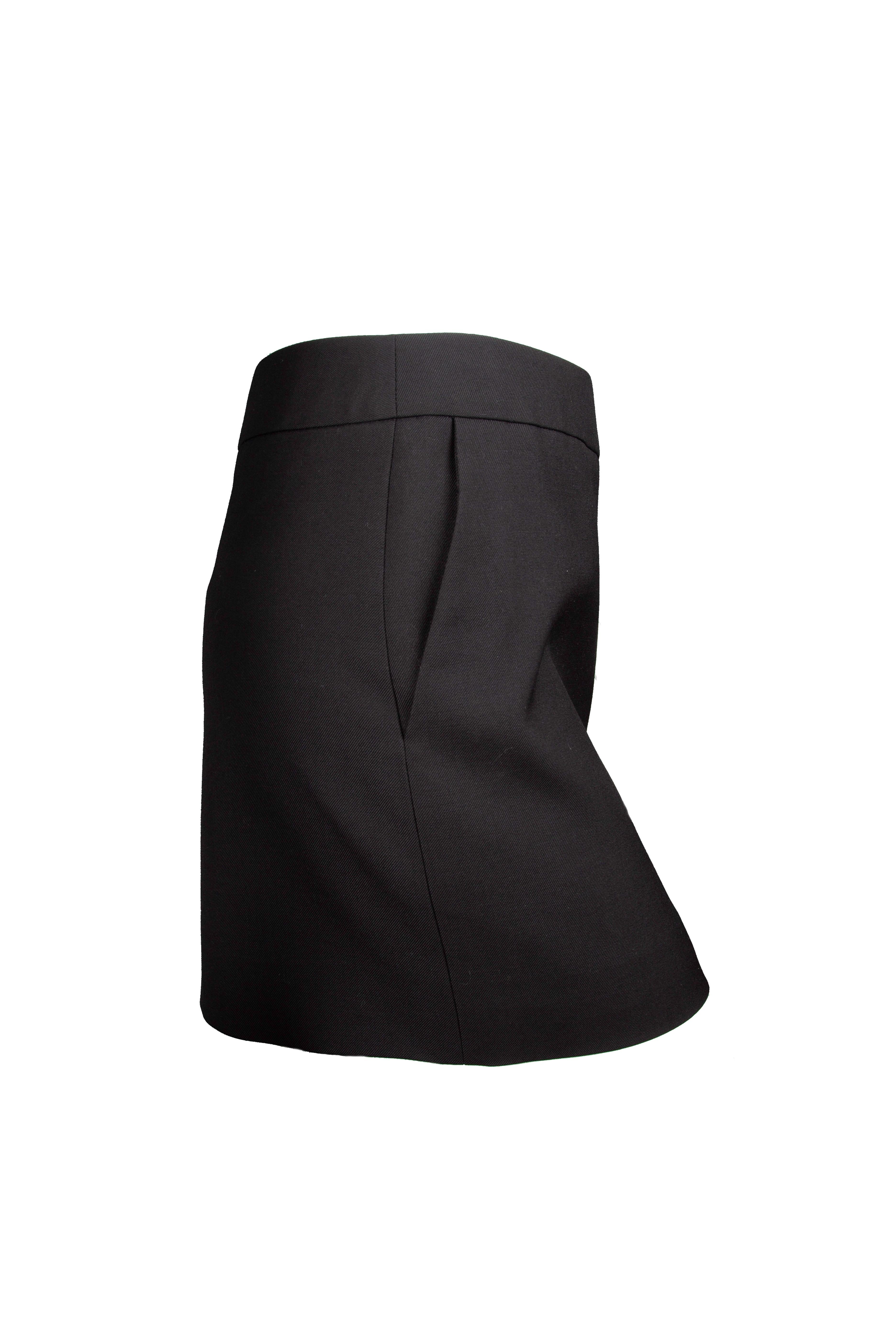 Saint Laurent black gabardine mini skirt - a closet staple featuring side pockets and a zipped closure in the back. Brand new with tags. Made in Italy. 

Size: 40 (FR)

Measurements:
Length: 14 in 
Waist: 16 in 

Material: Virgin Wool 100%, Silk