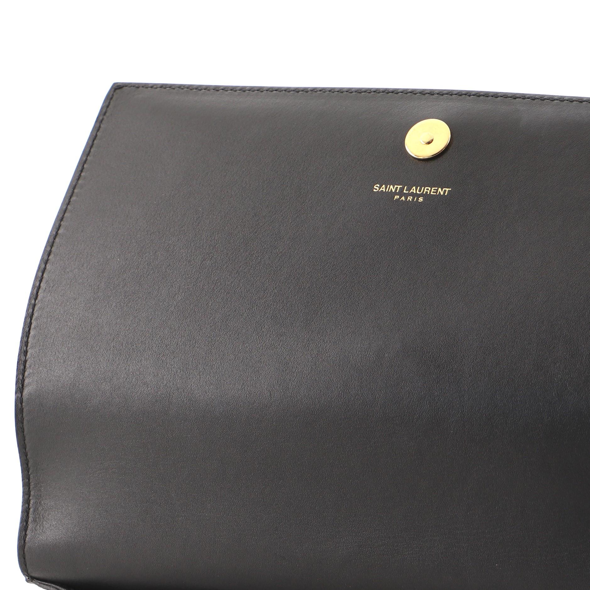 Saint Laurent Klassische Monogramm-Clutch aus Leder mit Patchwork 1