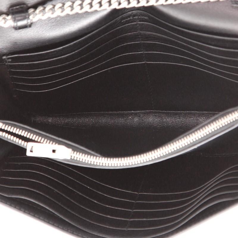 Saint Laurent Classic Monogram Crossbody Bag in pelle borchiata Media 1