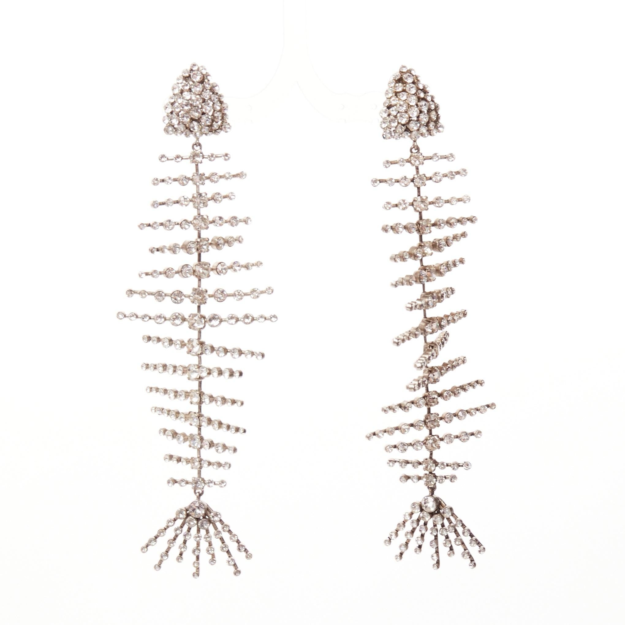 SAINT LAURENT clear crystal spiral fish bone dangling clip on earrings
Reference: AAWC/A01222
Brand: Saint Laurent
Material: Metal
Color: Silver
Pattern: Crystals
Closure: Clip On
Lining: Silver Metal
Extra Details: YSL logo