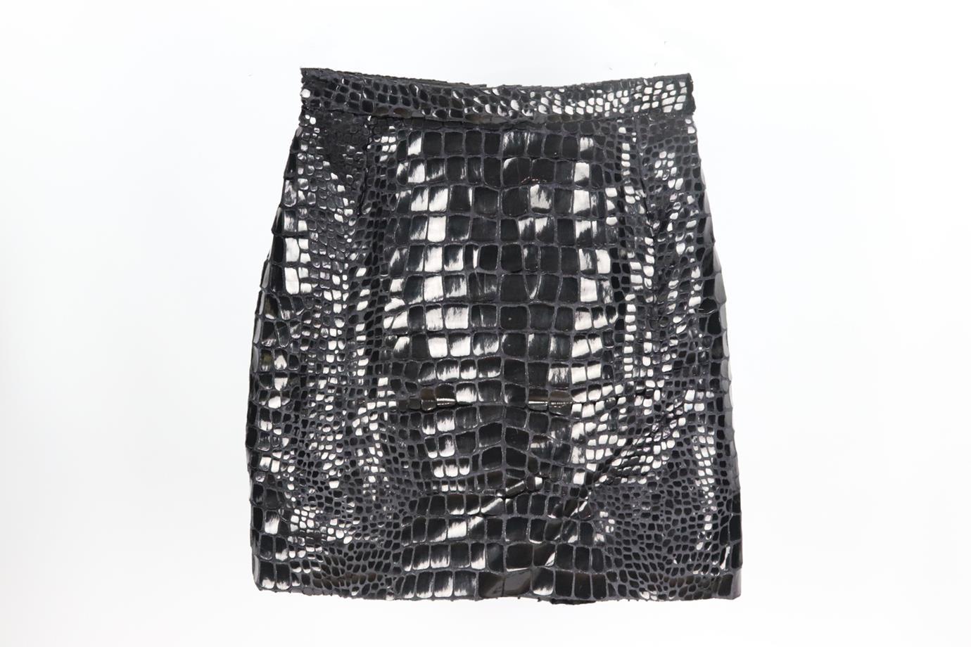 Saint Laurent croc effect vinyl and velvet mini skirt. Black. Zip fastening at back. 90% Viscose, 10% silk; trimming: 61% cotton, 39% silk; lining: 100% silk. Size: FR 36 (UK 8, US 4, IT 40). Waist: 25 in. Hips: 36 in. Length: 17.5 in. Very good
