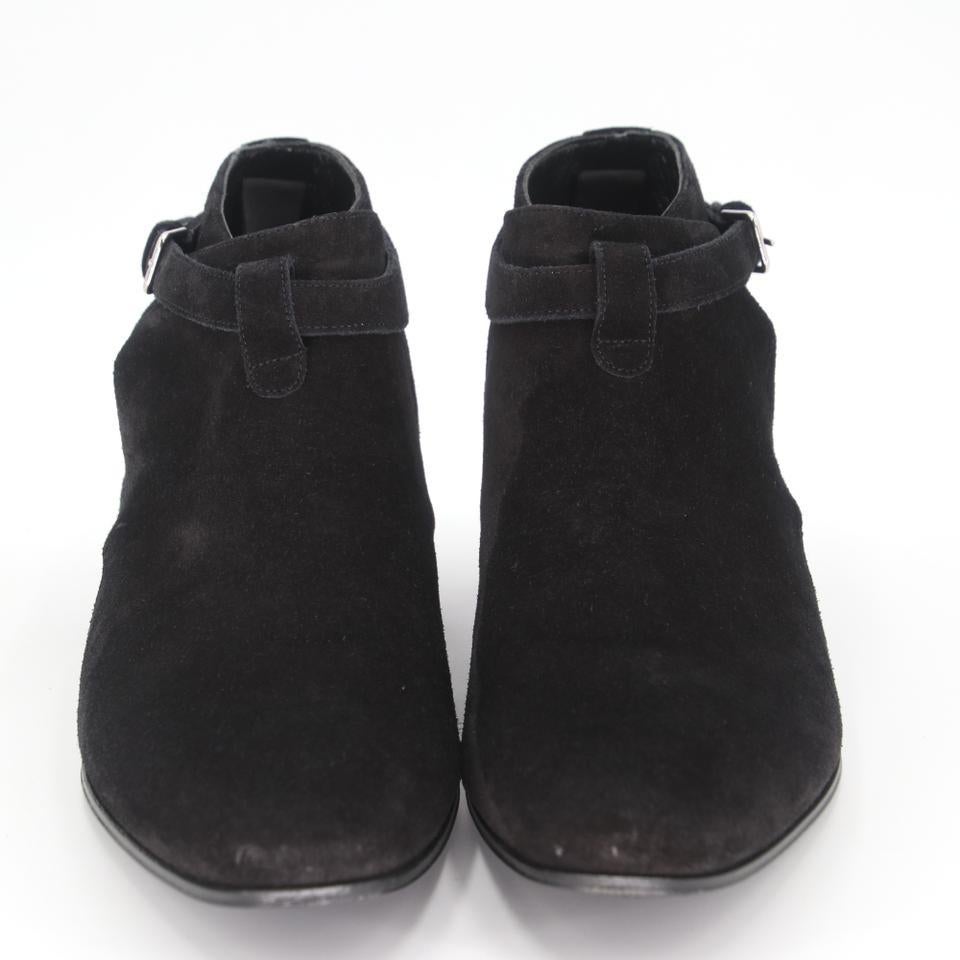 Saint Laurent Botines 43 de ante y piel Jodhpur SL-0923P-0005

Estos botines Jodhpur de ante y piel para hombre de Saint Laurent están de moda y complementarán tu vestuario en las próximas temporadas. Estos botines de ante negro liso se abrochan con