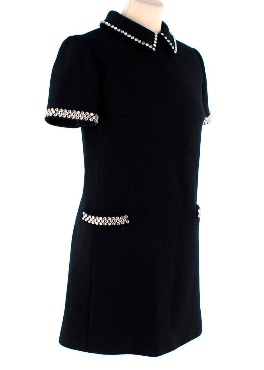 Saint Laurent Crystal Embellished Black Wool Mini Shift Dress
 

 - 60's inspired shift dress shape, featuring small point collar, short sleeves and 2 hip pockets embellished with iridescent glass crystals
 - Wool cloth with slight stretch
 - Darted