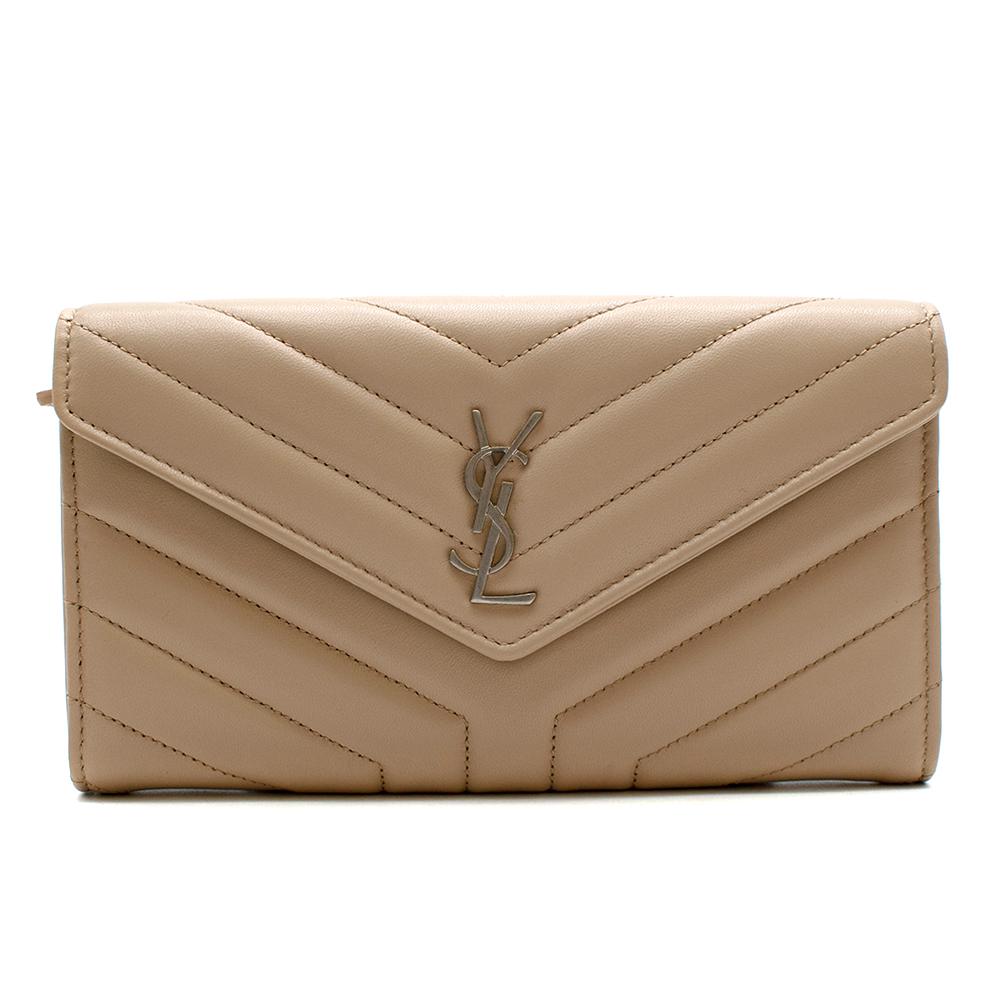 Saint Laurent Dark Beige Chevron Quilted Leather Long Wallet

- Made of soft leather 
- Classic design 
- Iconic YSL logo to the front 
- Silver tone hardware 
- Quilted texture 
- Neutral dark beige hue 
- Snap button fastening to the flap
- Twelve