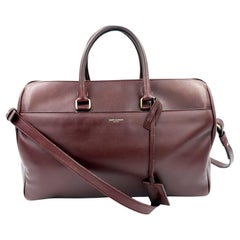 Saint Laurent Dark Burgundy Large Duffle Bag With Zip Top and Shoulder Strap