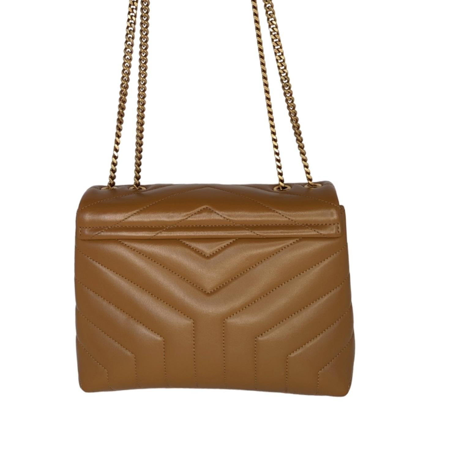 Saint Laurent Small Loulou Matelassé Leather Shoulder Bag with front flap, featuring the Cassandre, a leather and metal chain strap that can be worn doubled on the shoulder and y-quilted overstitching. Made in Italy. Retail price $2,950.

Designer: