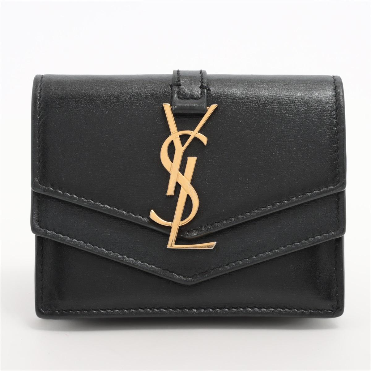 The Saint Laurent Double V Flap Short Leather Wallet is a sleek and sophisticated accessory that seamlessly combines style and practicality. Crafted from premium leather, the wallet features a unique double V flap design, adding a modern twist to