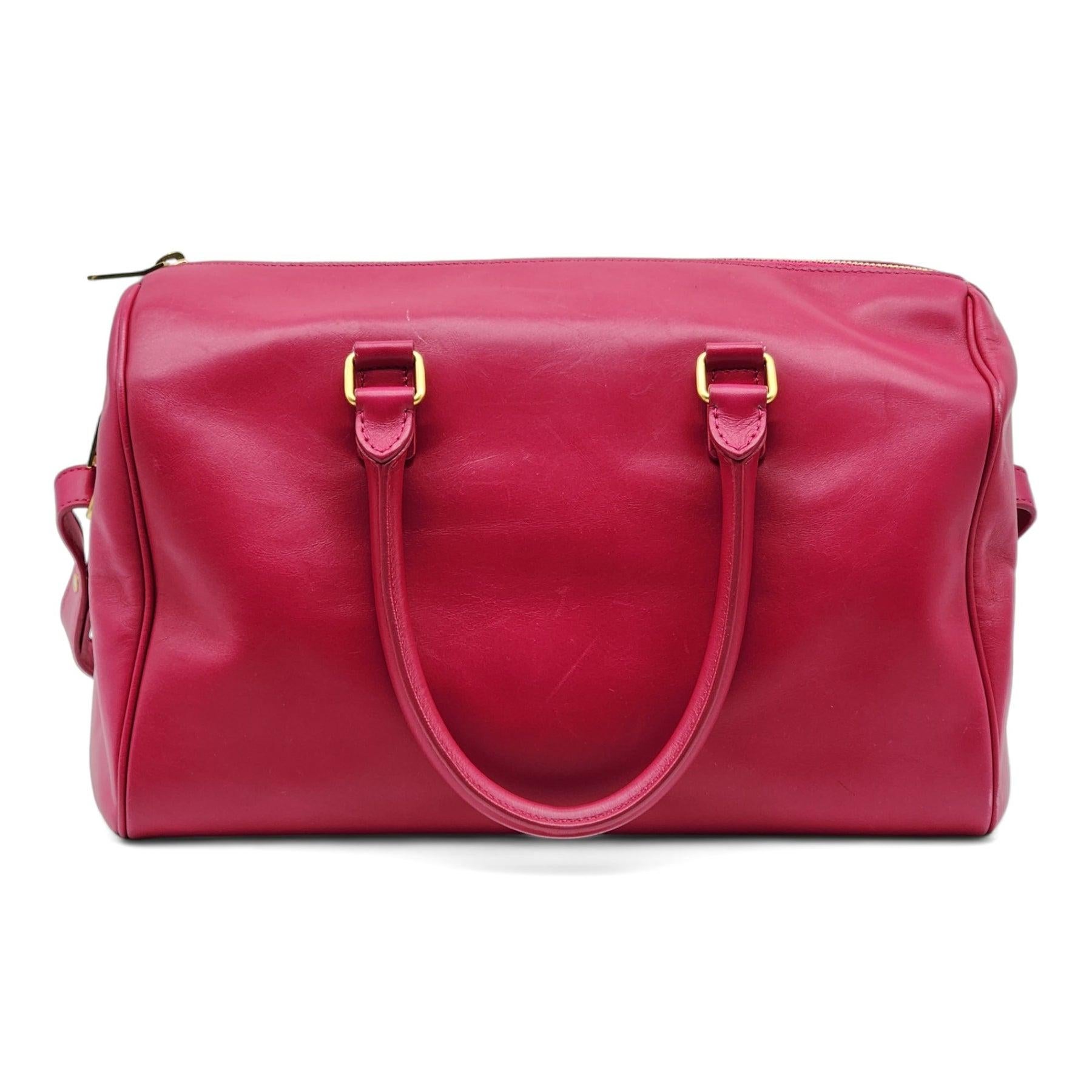 Saint Laurent Duffle Shoulder Bag in Pink. Gold-tone Hardware.

Additional information:
Material: Calfskin leather
Style: 314704
Color: Pink
Country: Italy
Dimension: 12
