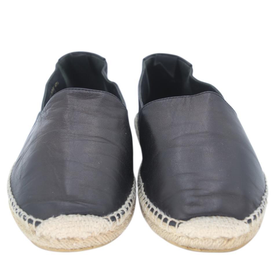 Saint Laurent Espadrille 40.5 Leather Flats SL-0525N-0219

These chic Saint Laurent Black Leather Espadrille Flats can enhance any style. Perfect for summertime, espadrille flats are a must have for any trendy fashionista! These flats include soft
