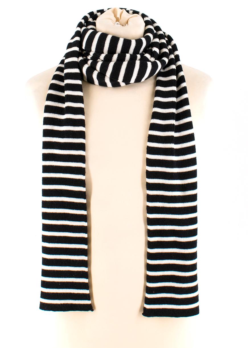 Saint Laurent Black and White Stripe Scarf

- Striped black and white body
- Knitted
- Extra Long Length

Please note, these items are pre-owned and may show signs of being stored even when unworn and unused. This is reflected within the