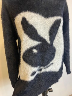 Saint Laurent Fall 2022 play boy sweater.