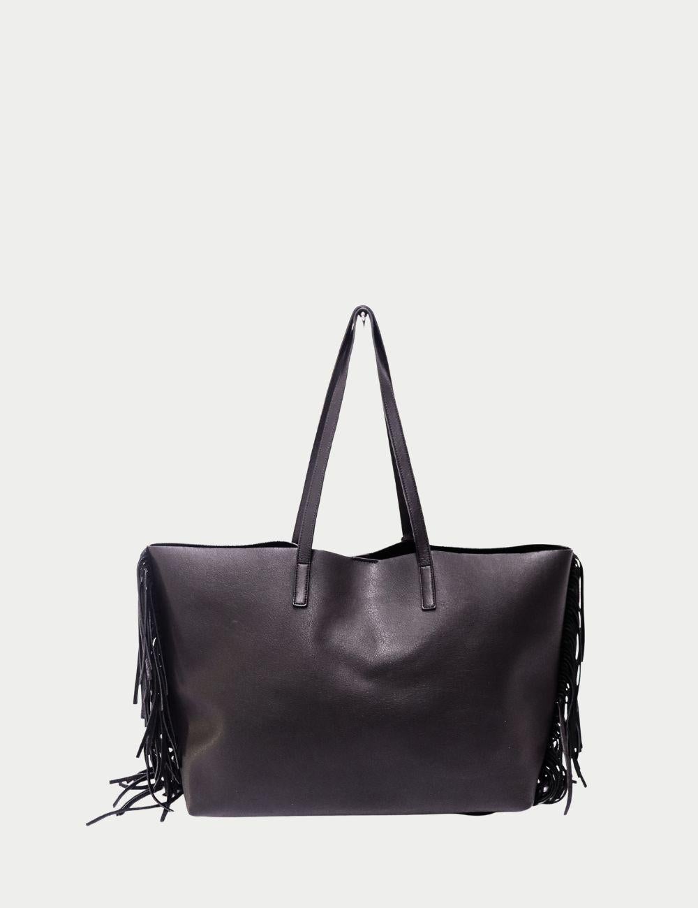 Saint Laurent Black Leather Tote Bag with Fringe Detailing

Carry timeless sophistication with this Saint Laurent black leather tote bag, designed with the brand’s signature Parisian edge. Crafted from smooth, high-quality leather, this spacious
