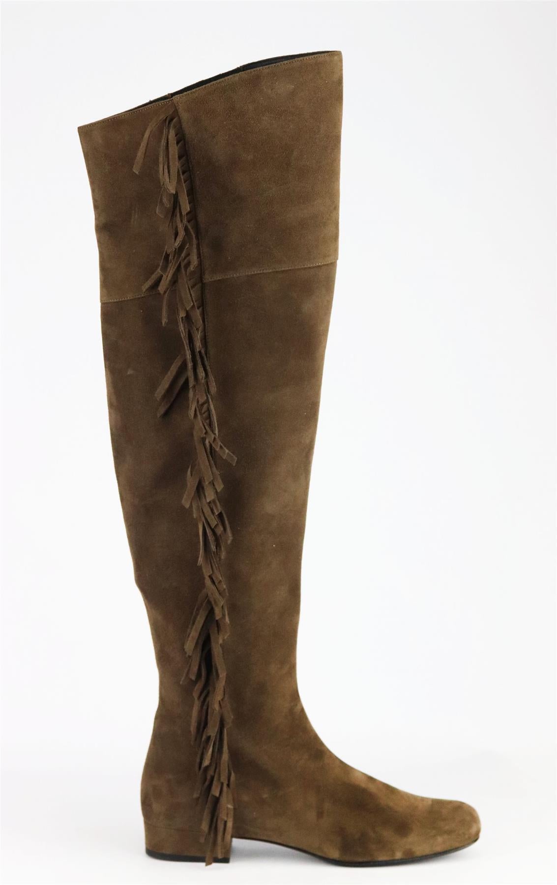 The knee-high boot is a new-season essential, and Saint Laurent champions the style with these brand new small block-heel, they're made from brown lamb-suede.
Heel measures approximately 20 mm / 1 inch.
Brown suede.
Zip fastening along back.
Does