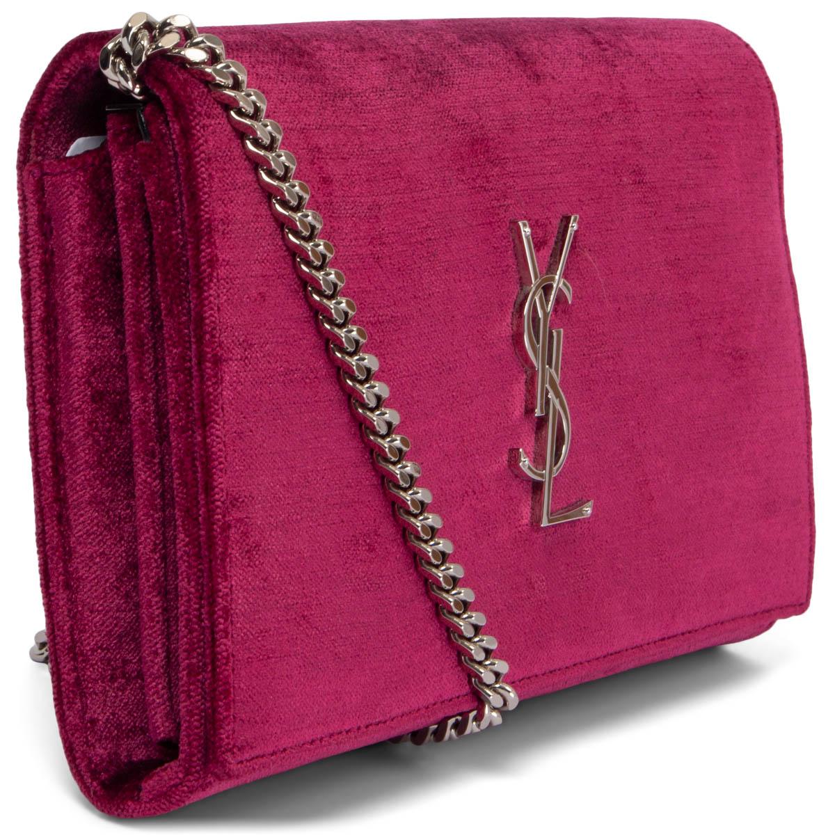 100% authentic Saint Laurent Kate WOC crossbody bag in velvet fuchsia with silver-tone metal YSL logo and chain shoulder strap. Opens with a push-button and is lined black leather with a zipper pocket in the middle and 20 credit card slots. Brand