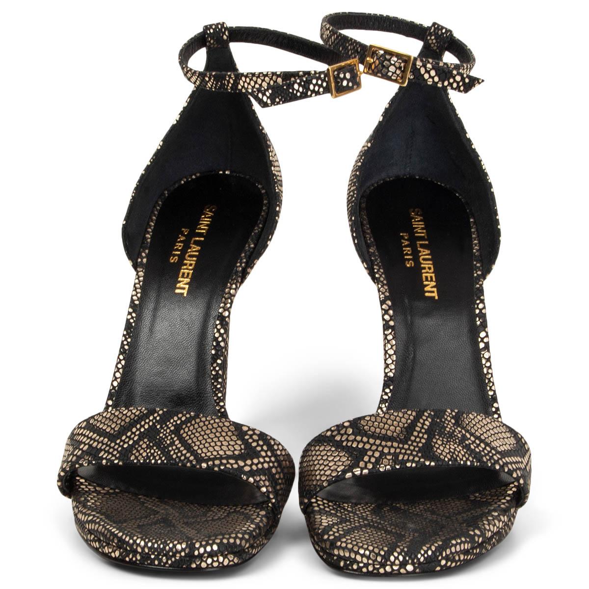 100% authentic Saint Laurent 'Python Disco Jane' ankle-strap sandals in metallic light gold-tone and black snakeskin embossed leather. Brand new. 

Measurements
Imprinted Size	38
Shoe Size	38
Inside Sole	25cm (9.8in)
Width	8cm (3.1in)
Heel	11.5cm
