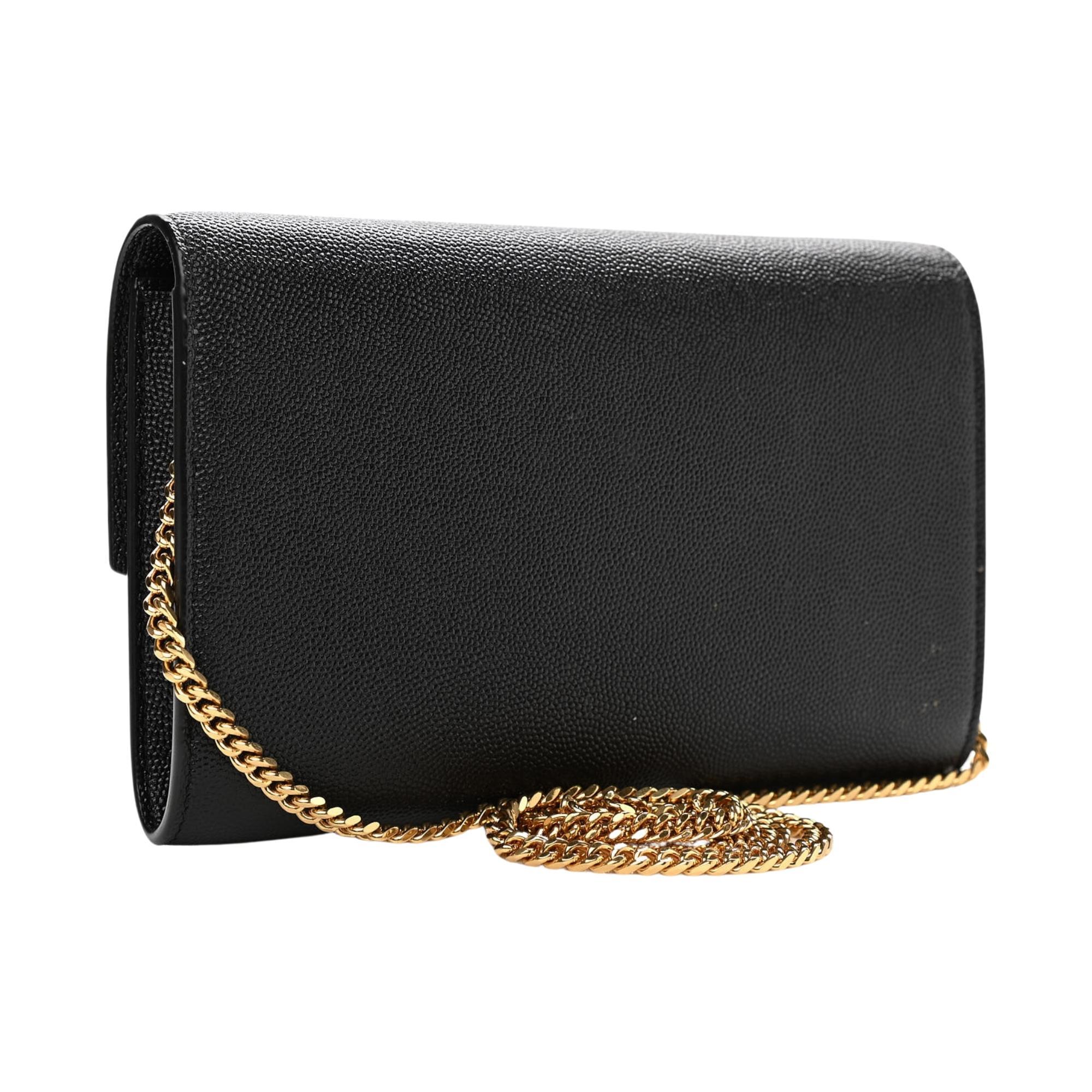 This bag is made of pebbled calfskin leather in black. The bag features an optional polished gold chain strap and a matching gold YSL monogram detail on the crossover flap. The bag opens to a black leather interior with a patch pocket.

COLOR: