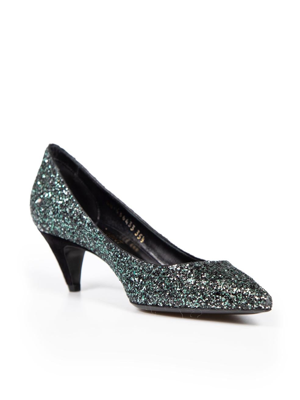 CONDITION is Very good. Minimal wear to pumps is evident. Minimal abrasion to the tip and small indents to the insole of the left shoe on this used Saint Laurent designer resale item.
 
 
 
 Details
 
 
 Green
 
 Glitter
 
 Pumps
 
 Point toe
 
 Mid