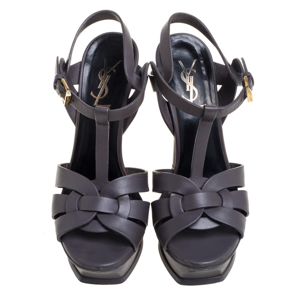 One of the most sought-after designs from Saint Laurent is their Tribute sandals. They are such a craze amongst fashionistas around the world, and it is time you own one yourself. These grey ones are designed with leather straps, ankle fastenings