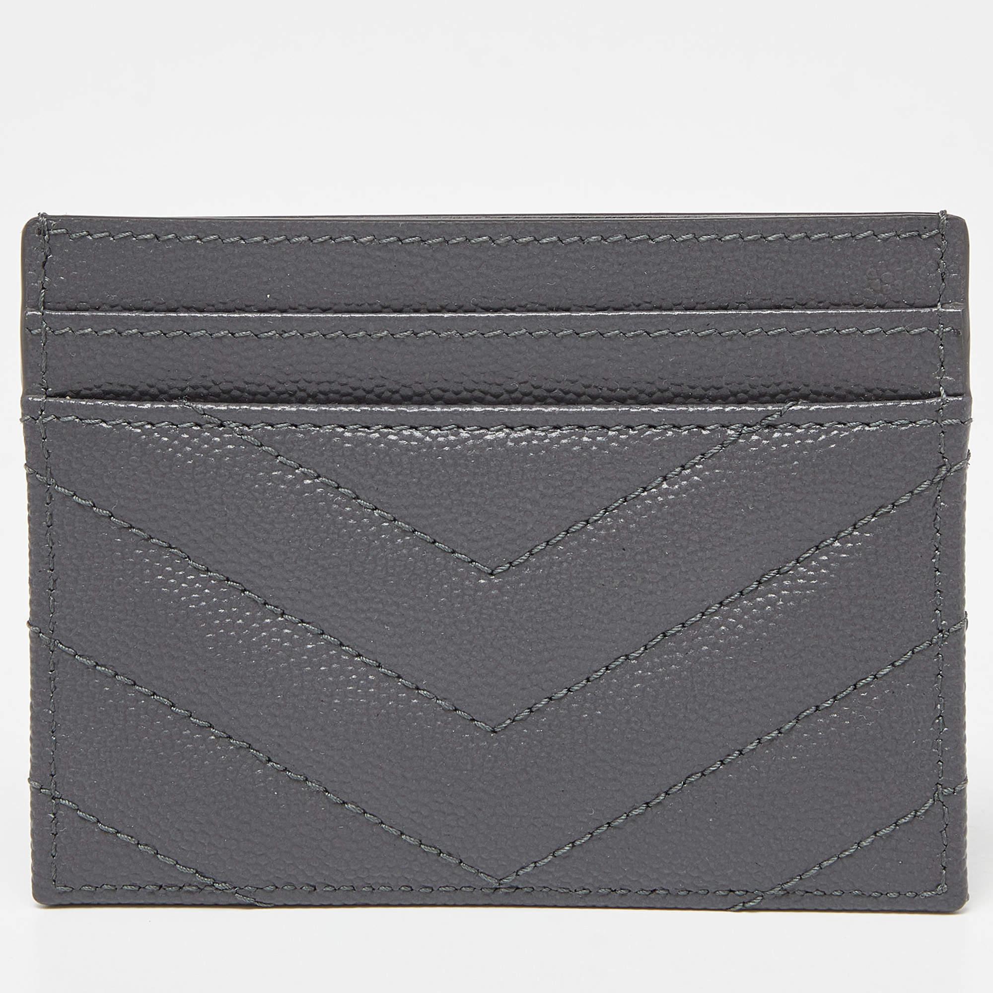 This stylish Saint Laurent card holder has been crafted from fine materials. It has ample slots that can easily hold your cards.

