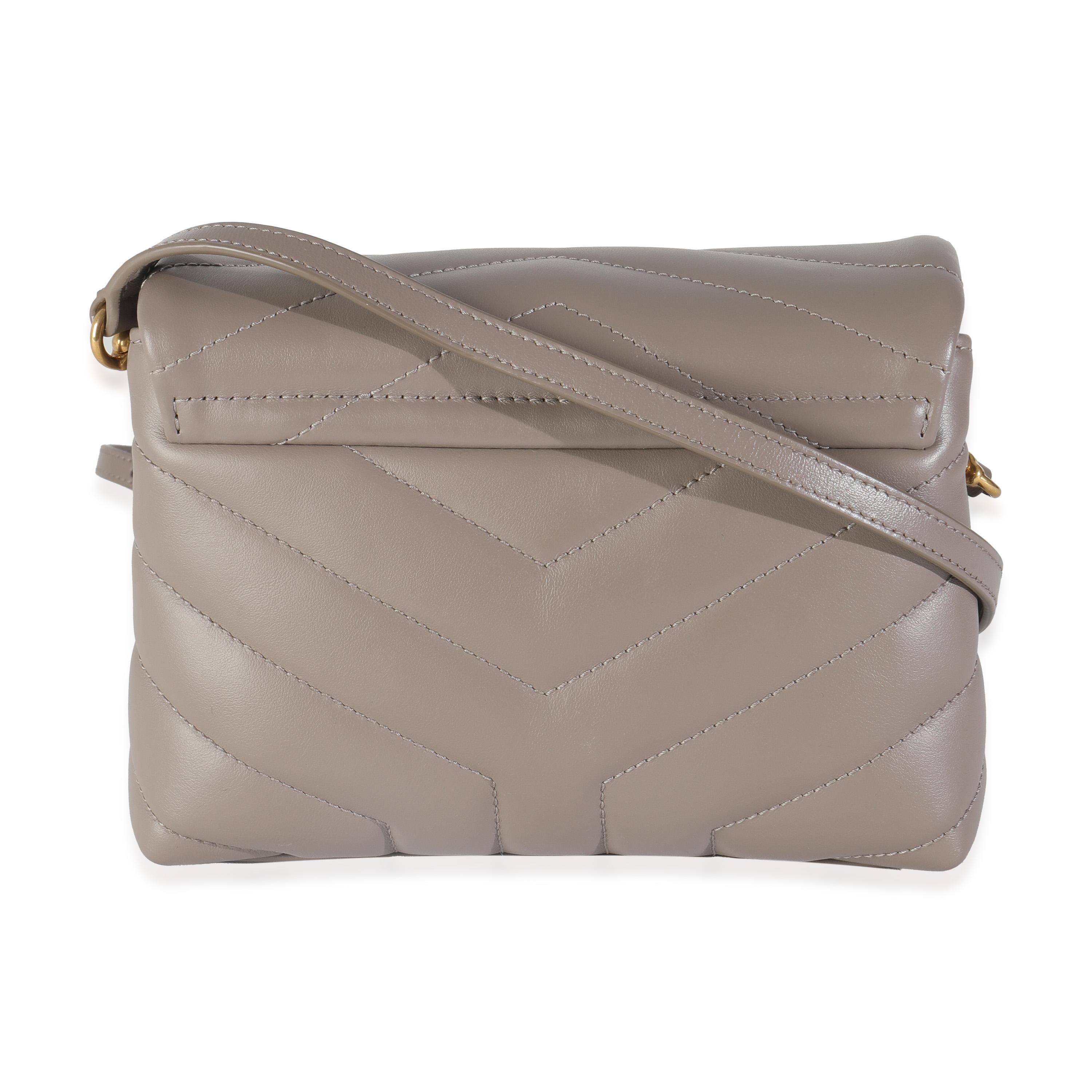 Listing Title: Saint Laurent Greyish Brown Y Quilted Calfskin Toy Loulou Crossbody
SKU: 144629
Condition: Pre-owned 
Condition Description: Named after Loulou de la Falaise, the Loulou bag from Saint Laurent is an ode to one of the founder's