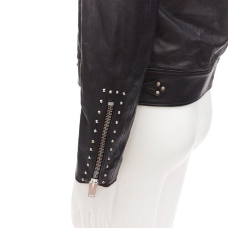 SAINT LAURENT Hedi Slimane 2013 black lambskin leather studded biker FR48 M
Reference: TGAS/D00966
Brand: Saint Laurent
Designer: Hedi Slimane
Collection: 2013
Material: Lambskin Leather
Color: Black, Silver
Pattern: Solid
Closure: Zip
Lining: Black