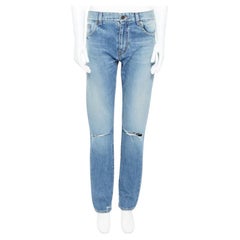 SAINT LAURENT Hedi Slimane jeans skinny in cotone blu strappato al ginocchio 29"