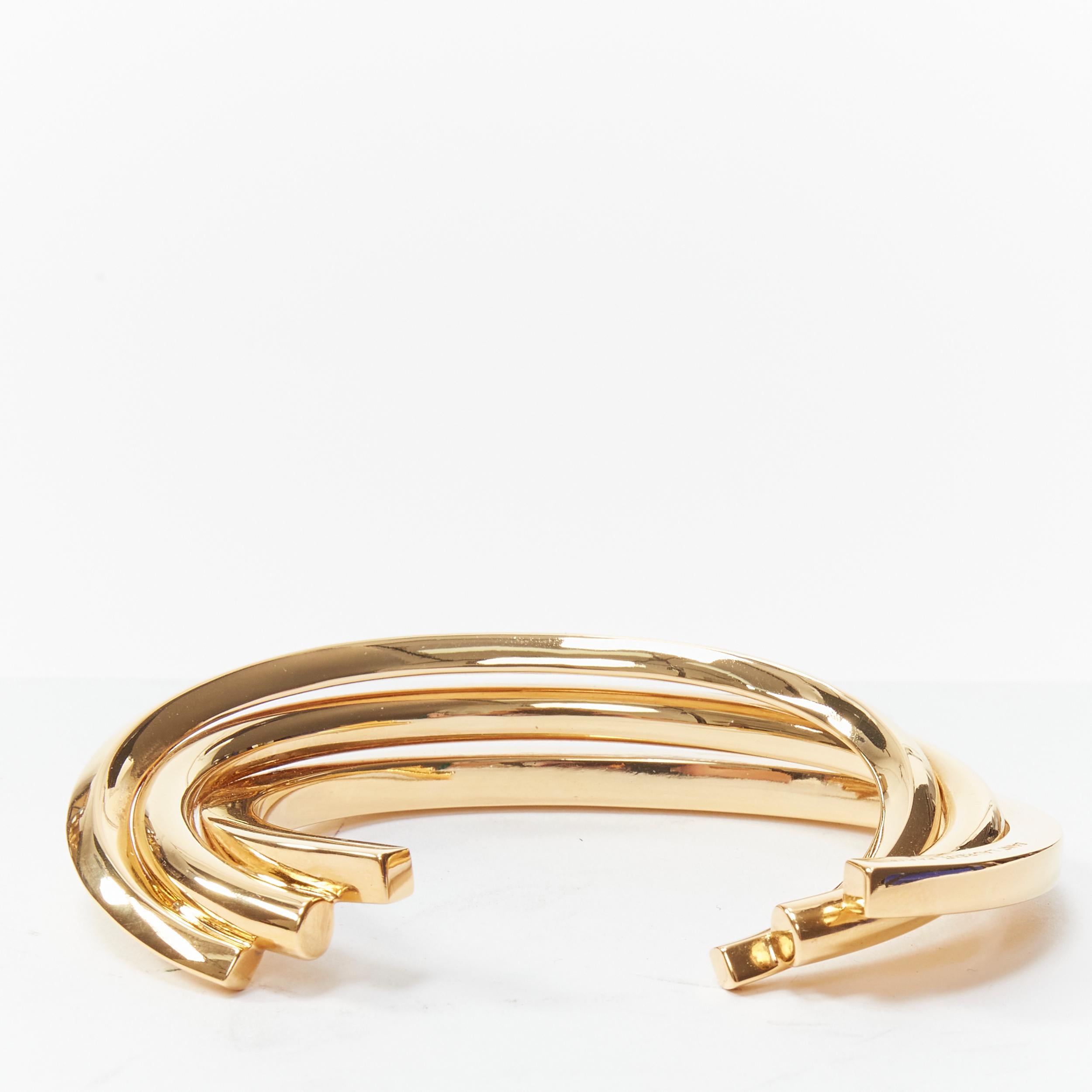 Gold SAINT LAURENT Hedi Slimane gold brass architectural triple twist cuff bracelet For Sale